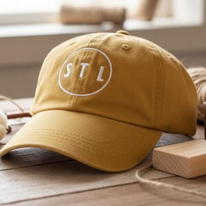 Custom Embroidered STL Airport Code Baseball Hat - Pigment Dyed Mustard St Louis Lambert Cardinals Cap