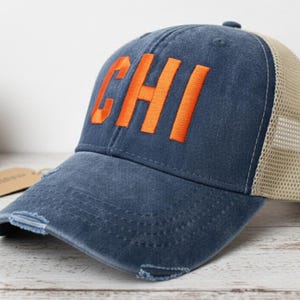 Custom Embroidered CHI Chicago Airport Code Distressed Navy Blue Trucker Hat Orange Letters Aviation Gift