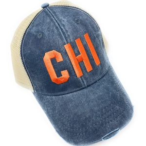 Custom Embroidered CHI Chicago Airport Code  Distressed Navy Blue Trucker Hat with orange letters