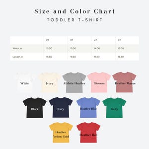 May include: A size and colour chart for toddler t-shirts. The chart displays measurements in inches for sizes 2T to 5T. Colours include white, ivory, athletic heather, blossom, heather mauve, black, navy, heather blue, kelly, heather yellow gold, and heather red.
