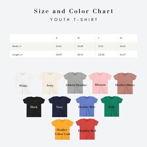 May include: A size and colour chart for youth t-shirts. The chart displays various colours, including white, ivory, black, navy, and heather yellow gold. Measurements are provided in inches for width and length across sizes S, M, L, and XL.