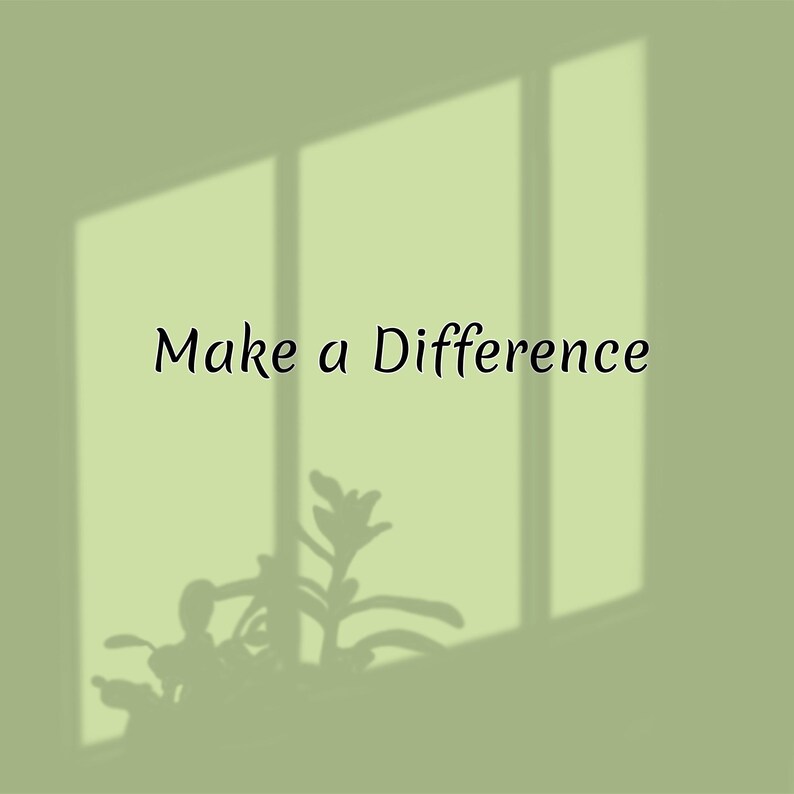 May include: A light green background with the text "Make a Difference" in black. The shadow of a window and a plant are visible, creating a natural, minimalist aesthetic.