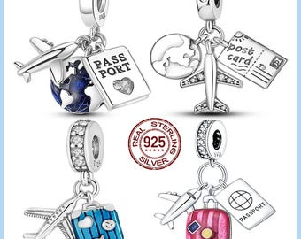 May include: Four sterling silver travel-themed charms. Each charm features a plane, passport, and other travel elements like a globe, postcard, and suitcase. The charms are detailed with blue, pink, and white accents.