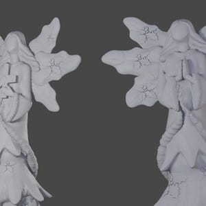 May include: Two white angel statues with large, detailed wings. The angels are depicted in flowing robes, with their hands clasped in prayer. The statues have a serene and elegant appearance, suitable for home decor.