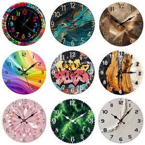 May include: Nine round wall clocks with various designs. The clocks feature a rainbow, graffiti, and gemstone patterns. Each clock has black hands and numerals. The clock faces are in various colors, including black, green, and brown.