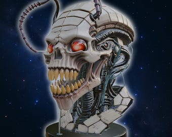 May include: A detailed sculpture of a skull with exposed teeth and glowing red eyes. The skull has a segmented, bone-like appearance with metallic and wire-like components. A dark base supports the sculpture, set against a starry background.