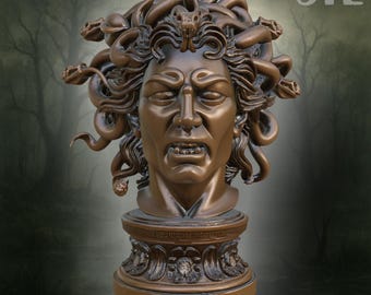 May include: A bronze-colored sculpture of Medusa's head, featuring snakes for hair and an angry expression. The sculpture is mounted on a detailed pedestal. The letters "STL" are visible in the upper right corner. The background is a blurred forest scene.