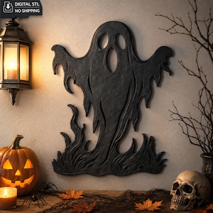 Puede incluir: Una decoración de pared en forma de fantasma negro con un diseño recortado, dos ojos ovalados y una boca abierta, que muestra una superficie texturizada con bordes fluidos en forma de llama, presentada como archivo digital STL.