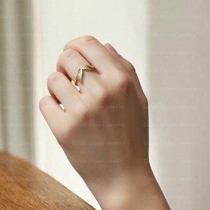 angel wings ring
wing ring silver
sterling silver ring
adjustable wing ring
minimalist ring
symbolic jewelry
dainty silver ring
everyday ring women
open ring design
feather wing ring
gift for her
modern silver ring
handmade style ring