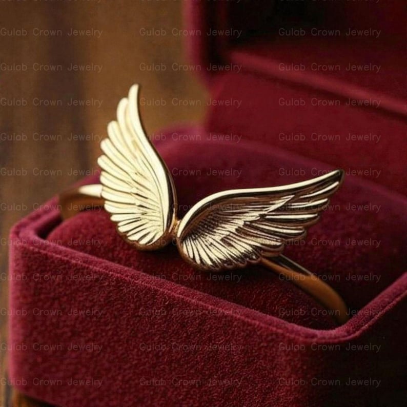 angel wings ring
wing ring silver
sterling silver ring
adjustable wing ring
minimalist ring
symbolic jewelry
dainty silver ring
everyday ring women
open ring design
feather wing ring
gift for her
modern silver ring
handmade style ring