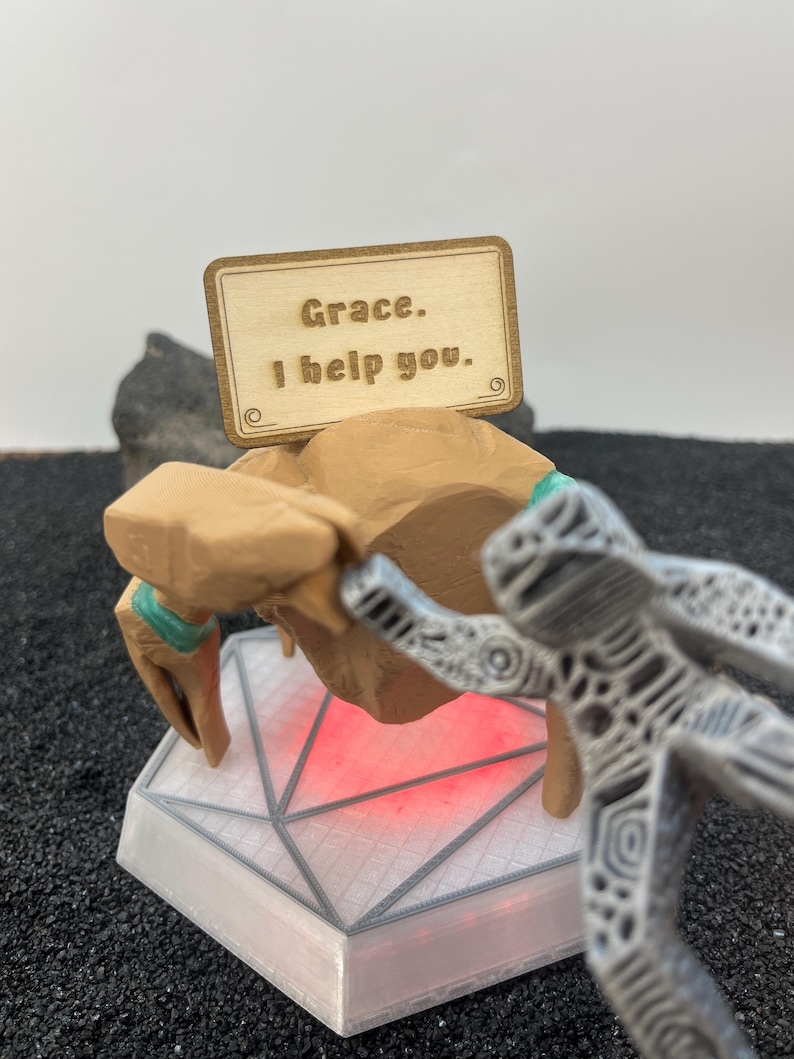 Project Hail Mary Rocky figure with iconic thumbs down hand pose, emotional support alien collectible with customizable quote sign and futuristic display base