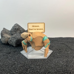 Project Hail Mary alien collectible featuring Rocky and Grace on illuminated sci fi hex display base