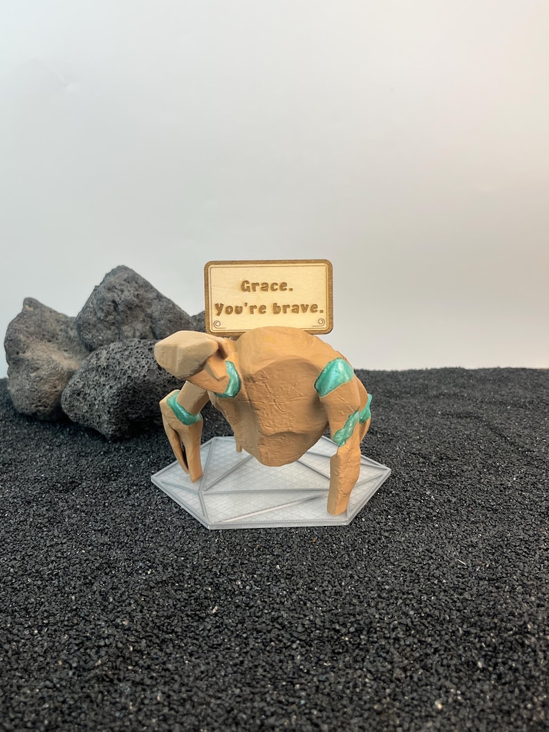 Project Hail Mary alien collectible featuring Rocky and Grace on illuminated sci fi hex display base