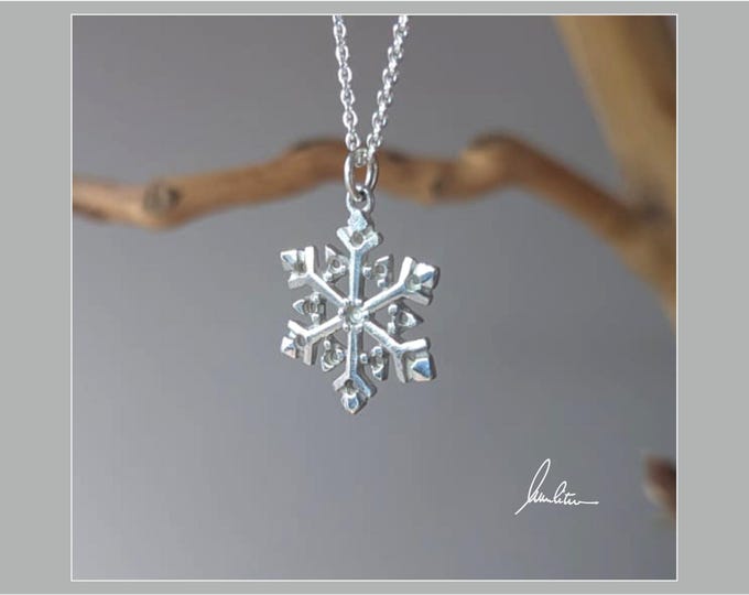 Snowflake pendant, snow star in silver