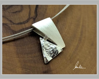 Pendant in silver with matte and polished surface