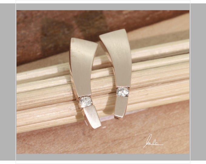Stud earrings in 585 red gold with diamond
