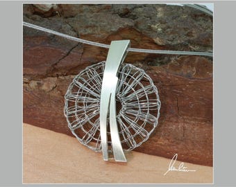 Pendant bobbin lace jewelry in stainless steel and silver