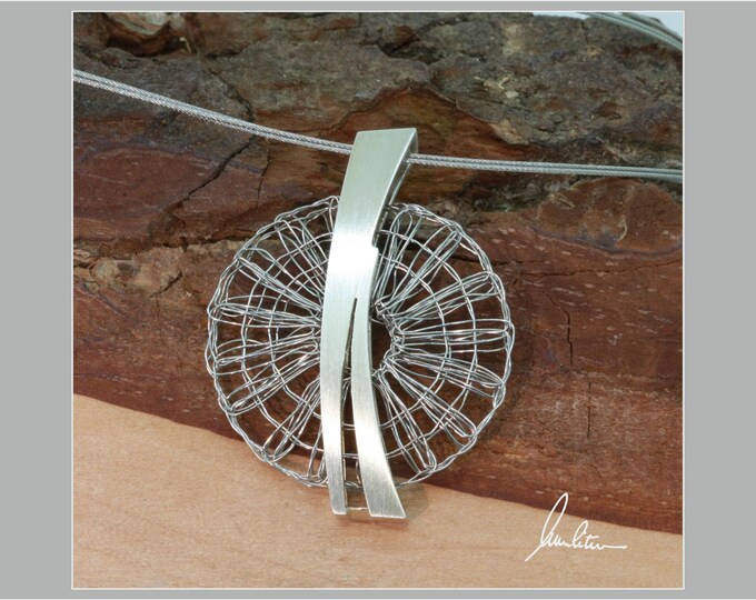 Pendant bobbin lace jewelry in stainless steel and silver