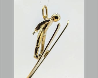 special sculpture pendant in gold, ski jumper, handmade