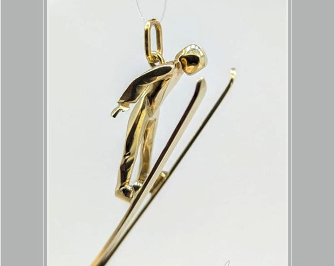 special sculpture pendant in gold, ski jumper, handmade