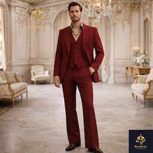 May include: A three-piece burgundy suit with a matching jacket, vest, and flared trousers. The suit is worn with a patterned shirt and gold jewelry. The image features the "SuitSync" logo in the top left and bottom right corners.