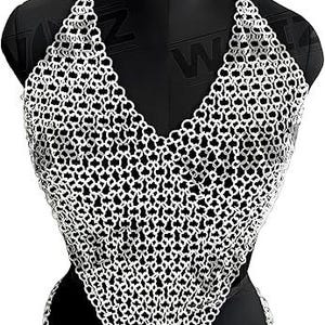 May include: A silver chainmail halter top and matching bottom set displayed on a black mannequin. The chainmail is made of small, interlocking metal rings, creating a textured, open weave design. The top has a deep V-neck.