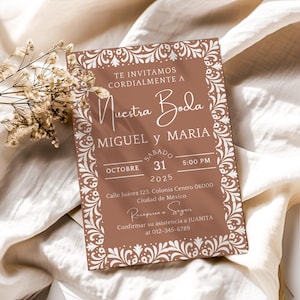 Editable Spanish wedding invitation template, Cielito Lindo Nuestra Boda design with brown neutral papel picado and Talavera theme, digital download.

Printable Mexican wedding invite in Spanish, Nuestra Boda design with rustic brown papel picado and neutral Talavera style, editable template.

Cielito Lindo wedding invitation, Spanish Mexican digital template with brown and neutral papel picado and Talavera tile patterns, customizable.

Invitaciones De Boda, Cielito Lindo Nuestra Boda Invitation