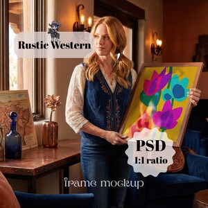 May include: A woman holds a framed artwork with a yellow background and colorful floral design. The frame is a light brown color. The image also includes the text "Rustic Western", "PSD 1:1 ratio", and "frame mockup".
