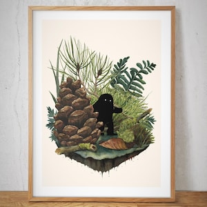 May include: A framed art print featuring a whimsical illustration of a black silhouette figure standing near a large pine cone. The artwork includes detailed depictions of ferns, pine needles, and moss, set against a cream-colored background. The frame is made of light-colored wood.