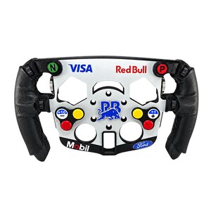 Könnte beinhalten: Ein Rennlenkrad im Formel-1-Stil mit schwarzen, strukturierten Griffen und einer silbernen Mittelplatte. Es verfügt über Tasten mit der Beschriftung N, P, +10, +1 sowie Logos für VISA, Red Bull, Mobil und Ford. Ein zentrales Emblem zeigt das Red Bull Logo.