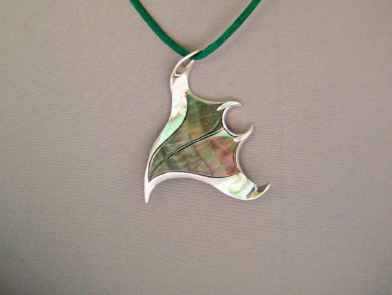 This Seawing Manta Ray Pendant Depicts The Beauty And Flow Of These Incredible Creatures - 