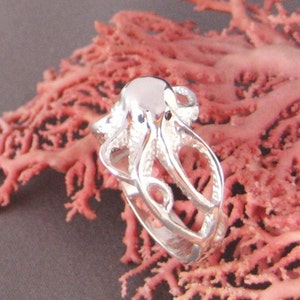 In the Depths/ Octopus ring in Sterling Silver w/Black Diamond eyes.