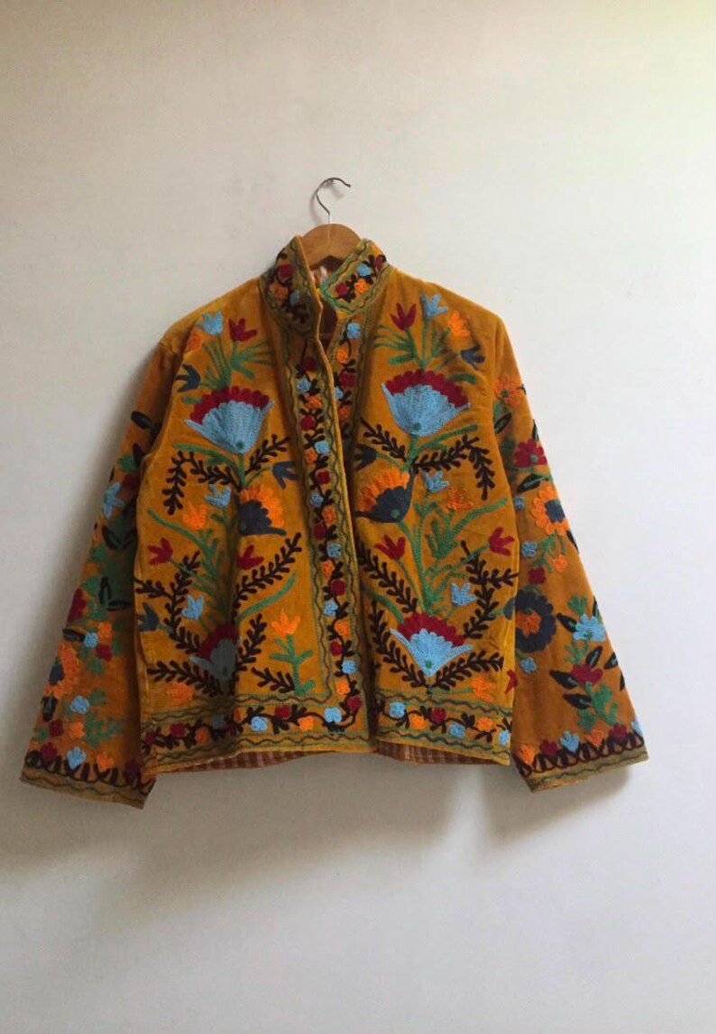 Velvet, Suzani, Jacket, Coat, Boho, Bohemian, Embroidered, Handmade, Artisan, Rabbit, Bunny, Floral, Flowers, Vintage, Ethnic, Traditional, Uzbek, Indian, Fashion, Outerwear, Winter, Casual, Festival, Gift, Womens, Unisex, Luxury, Elegant, Colorful, Soft, Cotton, Lining, Designer, Unique, Folk, Motif, Stitching, Needlework, Craftsmanship, Heritage, Boutique, Trendy, Statement, Layering, Cozy, Warm, Short, Premium, Stylish, Wearable.