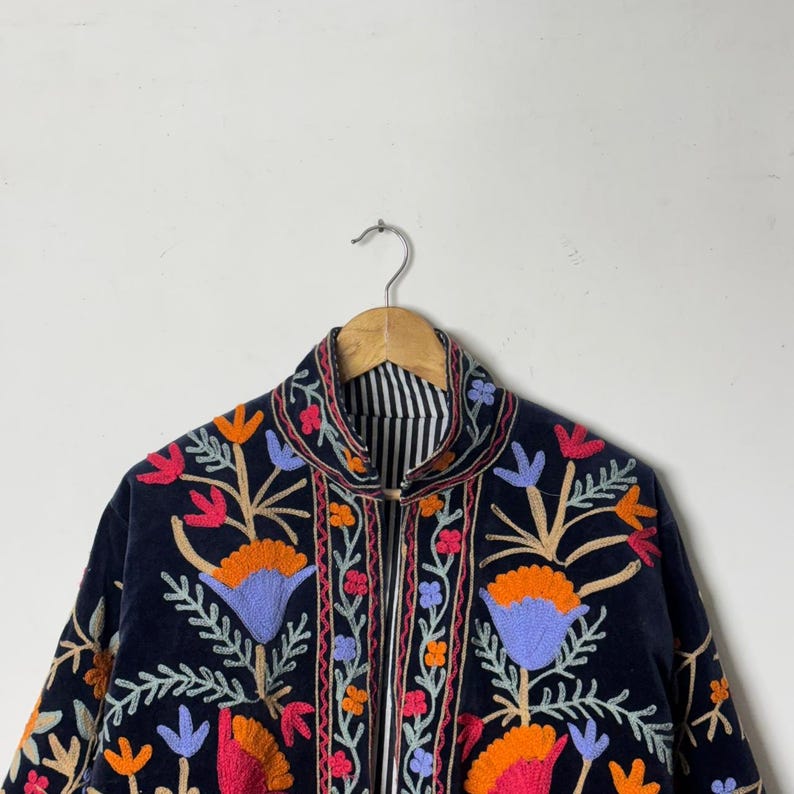 Velvet, Suzani, Jacket, Coat, Boho, Bohemian, Embroidered, Handmade, Artisan, Rabbit, Bunny, Floral, Flowers, Vintage, Ethnic, Traditional, Uzbek, Indian, Fashion, Outerwear, Winter, Casual, Festival, Gift, Womens, Unisex, Luxury, Elegant, Colorful, Soft, Cotton, Lining, Designer, Unique, Folk, Motif, Stitching, Needlework, Craftsmanship, Heritage, Boutique, Trendy, Statement, Layering, Cozy, Warm, Short, Premium, Stylish, Wearable.