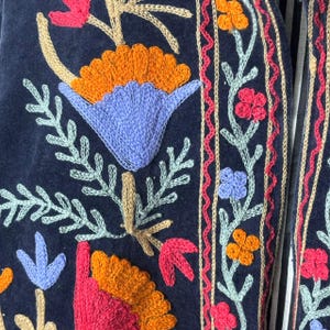 Velvet, Suzani, Jacket, Coat, Boho, Bohemian, Embroidered, Handmade, Artisan, Rabbit, Bunny, Floral, Flowers, Vintage, Ethnic, Traditional, Uzbek, Indian, Fashion, Outerwear, Winter, Casual, Festival, Gift, Womens, Unisex, Luxury, Elegant, Colorful, Soft, Cotton, Lining, Designer, Unique, Folk, Motif, Stitching, Needlework, Craftsmanship, Heritage, Boutique, Trendy, Statement, Layering, Cozy, Warm, Short, Premium, Stylish, Wearable.