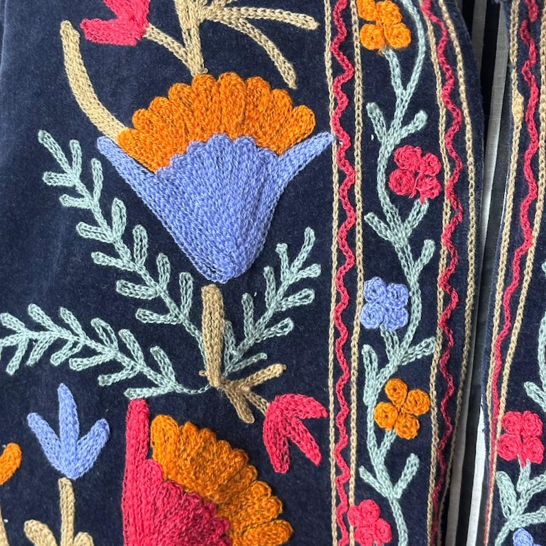 Velvet, Suzani, Jacket, Coat, Boho, Bohemian, Embroidered, Handmade, Artisan, Rabbit, Bunny, Floral, Flowers, Vintage, Ethnic, Traditional, Uzbek, Indian, Fashion, Outerwear, Winter, Casual, Festival, Gift, Womens, Unisex, Luxury, Elegant, Colorful, Soft, Cotton, Lining, Designer, Unique, Folk, Motif, Stitching, Needlework, Craftsmanship, Heritage, Boutique, Trendy, Statement, Layering, Cozy, Warm, Short, Premium, Stylish, Wearable.