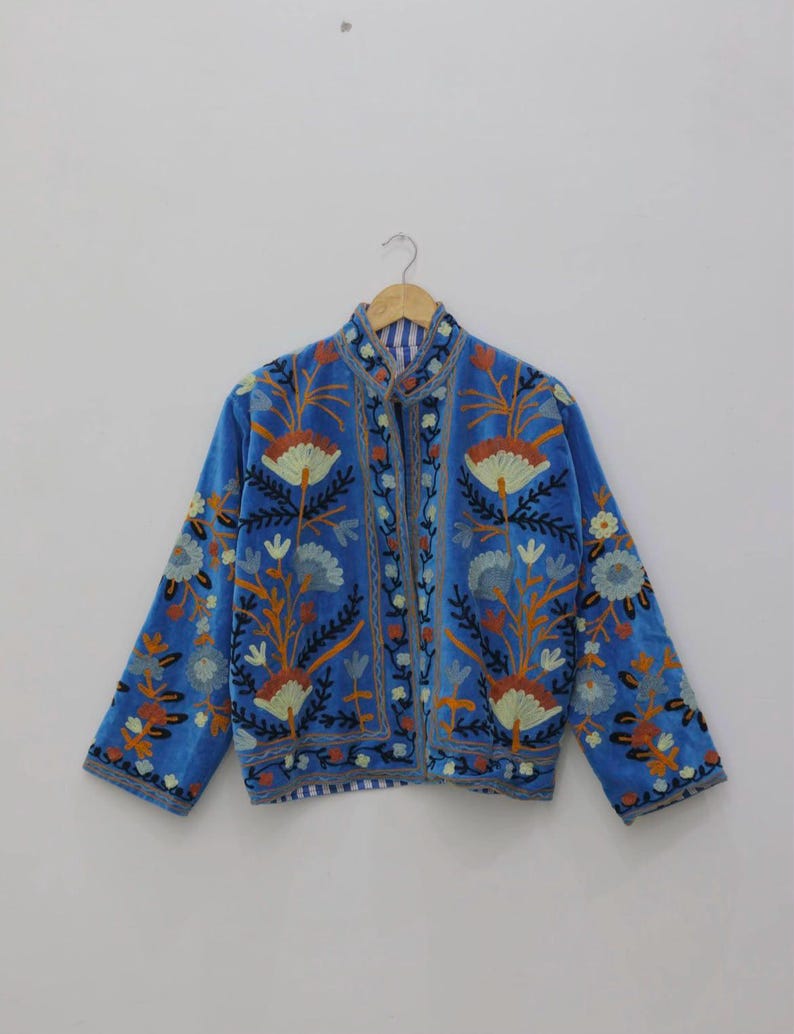 Velvet, Suzani, Jacket, Coat, Boho, Bohemian, Embroidered, Handmade, Artisan, Rabbit, Bunny, Floral, Flowers, Vintage, Ethnic, Traditional, Uzbek, Indian, Fashion, Outerwear, Winter, Casual, Festival, Gift, Womens, Unisex, Luxury, Elegant, Colorful, Soft, Cotton, Lining, Designer, Unique, Folk, Motif, Stitching, Needlework, Craftsmanship, Heritage, Boutique, Trendy, Statement, Layering, Cozy, Warm, Short, Premium, Stylish, Wearable.