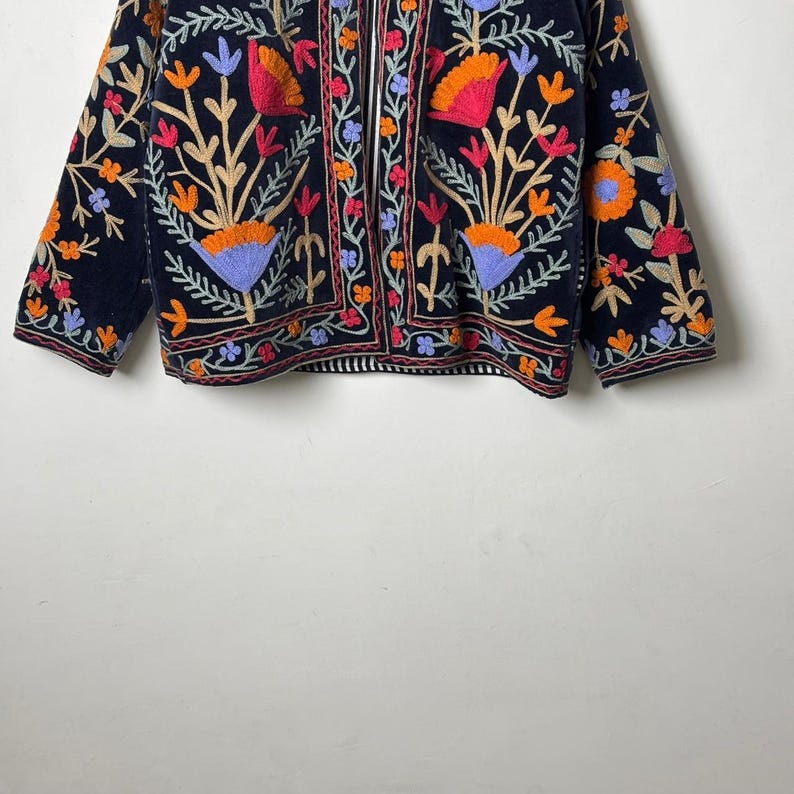 Velvet, Suzani, Jacket, Coat, Boho, Bohemian, Embroidered, Handmade, Artisan, Rabbit, Bunny, Floral, Flowers, Vintage, Ethnic, Traditional, Uzbek, Indian, Fashion, Outerwear, Winter, Casual, Festival, Gift, Womens, Unisex, Luxury, Elegant, Colorful, Soft, Cotton, Lining, Designer, Unique, Folk, Motif, Stitching, Needlework, Craftsmanship, Heritage, Boutique, Trendy, Statement, Layering, Cozy, Warm, Short, Premium, Stylish, Wearable.