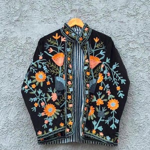 Velvet, Suzani, Jacket, Coat, Boho, Bohemian, Embroidered, Handmade, Artisan, Rabbit, Bunny, Floral, Flowers, Vintage, Ethnic, Traditional, Uzbek, Indian, Fashion, Outerwear, Winter, Casual, Festival, Gift, Womens, Unisex, Luxury, Elegant, Colorful, Soft, Cotton, Lining, Designer, Unique, Folk, Motif, Stitching, Needlework, Craftsmanship, Heritage, Boutique, Trendy, Statement, Layering, Cozy, Warm, Short, Premium, Stylish, Wearable.