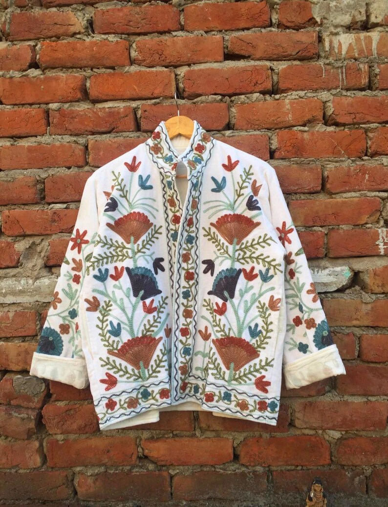 Velvet, Suzani, Jacket, Coat, Boho, Bohemian, Embroidered, Handmade, Artisan, Rabbit, Bunny, Floral, Flowers, Vintage, Ethnic, Traditional, Uzbek, Indian, Fashion, Outerwear, Winter, Casual, Festival, Gift, Womens, Unisex, Luxury, Elegant, Colorful, Soft, Cotton, Lining, Designer, Unique, Folk, Motif, Stitching, Needlework, Craftsmanship, Heritage, Boutique, Trendy, Statement, Layering, Cozy, Warm, Short, Premium, Stylish, Wearable.