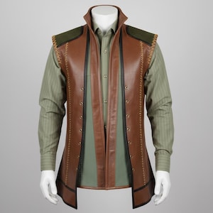 May include: A brown leather vest with a high collar and olive green accents. The vest features black trim, decorative stitching, and metal eyelets. It is layered over a green button-down shirt.
