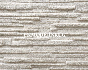 Alfombra de lana blanca texturizada, decoración minimalista moderna