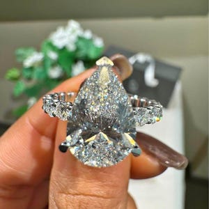 4.88 Carat Pear Lab Grown Diamond Engagement Ring: Hidden Halo, IGI Certified