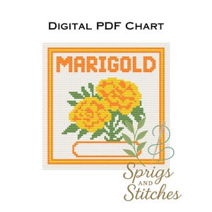 May include: A digital PDF chart featuring a cross-stitch design of marigold flowers. The word "MARIGOLD" is displayed in orange block letters above the flowers. The design includes green leaves and is framed in orange.