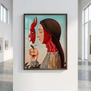 Puede incluir: Una obra de arte surrealista enmarcada representa a una mujer sosteniendo una manzana, con una máscara de diablo rojo a su lado. La cara y el cuello de la mujer están pintados de rojo, con venas visibles. La obra se exhibe en una galería blanca.
