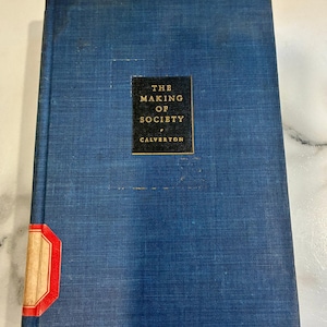 May include: A vintage book titled "The Making of Society" by Calverton. The book has a blue cover with a rectangular black and gold label. A red and tan label is on the spine. The book is in good condition.