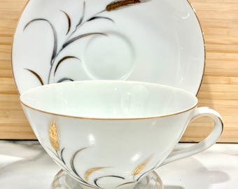 Taza de té y platillo de porcelana fina vintage de CTSI Correct Table Service Inc., década de 1950