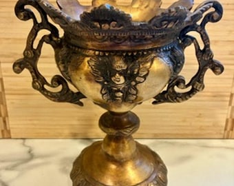 1960s Brass Ornate Neoclassical Double Handled Pedestal Urn Vessel Cherub Masks