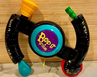 Juego electrónico portátil Bop It Extreme de Hasbro, año 1998, probado y en funcionamiento.