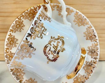 Taza y platillo de porcelana fina vintage MCM de los años 50, marca Paragon England Father, con baño de oro de 22 quilates.